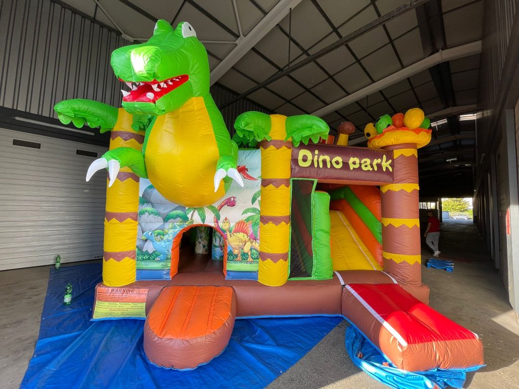 Dino Hüpfburg Verleih Mieten Hüpfburgen Huepfburgen bouncy castles Wunder Event WunderEvent Party Geburtstag Slushi Popcorn Event Feier